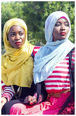 Two Muslim Women. African Muslimah. Nigerian Muslimah. Striving For Modesty. Online Hijab Brand. Strobing Scarf. Dynamite Studded Scarf.